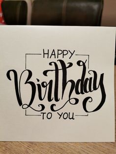 a card with the words happy birthday to you written on it in cursive writing