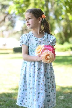 This elegant smocked dress is made of high quality jade green and brown floral fabric and finished off with green stitch hand smocking around the chest. The dress is perfect for casual wear and formal occasions as well. This dress is made of 100% cotton fabric which will keep your little cool and comfortable. *  100% Cotton *  Handmade *  Tie at the back *  Lightweight, soft cotton, comfortable, and ready to play *  Hand wash or machine wash on a delicate setting We are based in Sydney, New Sout Green Smocked Short Sleeve Dress For Daywear, Spring Smocked Dress With Gathered Neckline And Fitted Bodice, Green Smocked Dress With Short Sleeves, Fitted Smocked Dress With Smocked Cuffs For Garden Party, Spring Cotton Smocked Dress With Elastic Neckline, Spring Garden Party Smocked Dress With Elastic Neckline, Green Cotton Smocked Short Sleeve Dress, Green Cotton Smocked Dress With Short Sleeves, Spring Pastoral Dress With Smocked Bodice