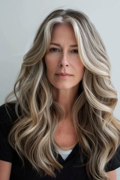 Discover long hairstyles for women over 40 that radiate sophistication and timeless style. See more ideas here. Waterfall Braid