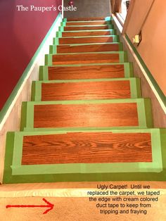 the stairs are painted green and red with an arrow pointing up to it's bottom