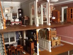 a doll house with furniture and accessories on the top floor is shown in this image