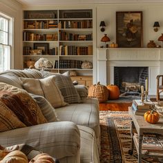 a living room filled with furniture and a fire place