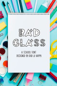 a notebook with the words rad glaa on it surrounded by school supplies