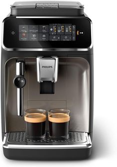 an espresso machine with two cups of coffee