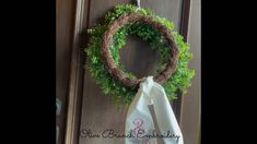 a wreath hanging on the front door