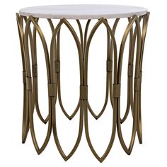 a white marble top table with gold metal legs and curved design on the bottom, against a white background