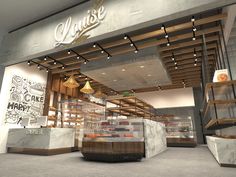 the inside of a deli shop with marble counter tops and wooden steps leading up to it