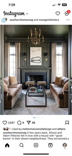 a living room with two couches and a coffee table in front of a fireplace