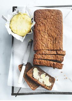 some bread and butter on a tray