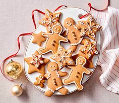 a plate full of ginger cookies on a table