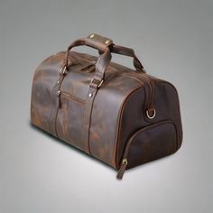 Adeeva Leather  Special offer Flat 70% Off With Free Shipping  ✍✍Free Personalization  Free Gift Wrapping Free Shipping ✔✔ Introducing our premium Full Grain Cowhide Leather Weekender Bag - the epitome of style and functionality. Handcrafted with love and attention to detail, this leather duffel bag is a must-have for every discerning traveler. 🔰 Key Features 🔰 ◼ Luxurious Full Grain Leather: This weekender bag is crafted from the finest full grain cowhide leather, known for its natural beauty Brown Duffle Bag With Top Handle For Overnight Trips, Rectangular Duffle Bag With Luggage Sleeve As Gift, Brown Duffle Bag With Luggage Sleeve As Gift, Functional Leather Bag Gift, Functional Leather Bag As Gift, Large Capacity Rectangular Duffle Bag Gift, Functional Bags With Luggage Sleeve As Gift, Luxury Leather-lined Weekender Bag For Overnight Trips, Leather-handled Duffle Bag For Weekend Trips