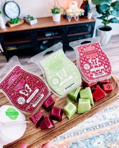 three different types of wax on a wooden tray