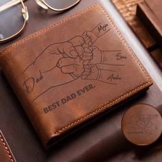 Personalized Dad And Kids Hands Engraved Leather Wallet, Father's Day Gift, Gift for Dad, Leather Wallet Gift for Daddy This leather wallet is a unique and personalized gift option for any special occasion. carefully designed and produced, every detail shows excellent craftsmanship and beauty. You can also personalize it with the recipient's name and more to make the gift unique. Whether gifting it to a friend, family member, loved one or partner, this leather wallet is the perfect choice. Produ Embossed Brown Wallets As Gift, Engraved Bifold Wallets For Gift, Engraved Bifold Wallets As Gifts, Engraved Bifold Wallet As Gift, Leather Wallets With Engraved Logo Gift, Money Clips, Wallet Gifts, Kids Hands