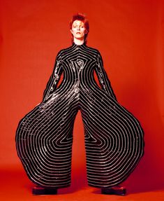 Striped bodysuit for Aladdin Sane tour designed by Kansai Yamamoto (1973), photograph by Masayoshi Sukita from The David Bowie Archive Designer Overalls, Duncan Jones, David Bowie Ziggy, Kansai Yamamoto, Lauryn Hill, Designer Jumpsuits, Let's Dance, Ziggy Stardust, Striped Bodysuit