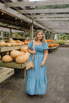 Stay stylishly comfortable with our Smocked Chambray Puff Sleeve Midi Dress. The smocked design perfectly hugs your curves while the puff sleeves add a playful touch. Made with high-quality chambray fabric for a lightweight and breathable feel, this dress is perfect for your dressier fall occasions. Soft woven chambray fabric Stretchy smocked bodice Square neckline Short puff sleeves Midi length Ruffle detail on skirt Sizing: Small- 0/1-4/5 Medium- 6/7-8/9 Large- 10/11-12/13 Kait is 5’3”, size 1 Puff Sleeve Midi Dress, Chambray Fabric, Sleeve Midi Dress, Square Neckline, Puff Sleeves, Chambray, Midi Length, Smocking, Puff Sleeve