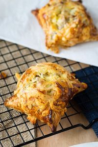 two pieces of food sitting on top of a cooling rack