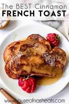 french toast on a plate with strawberries and powdered sugar