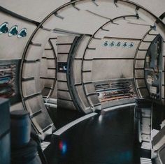 the inside of a futuristic space station with mirrors