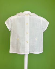 Made in Spain Shirt: 100% cotton; Shorts: 67% polyester 33% cotton Final sale, no exchanges nor returns will be accepted after purchase Cream Cotton Shirt For Daywear, White Collared Top For Daywear, White Cotton Collared Top, Classic White Summer Shirt, Classic White Tops For Daywear, White Cotton Shirt For Daywear, White Cotton Tops For Daywear, Classic White Cotton Top, Classic White Top For Summer