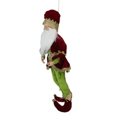 a christmas ornament with a santa clause hanging from it's side on a white background