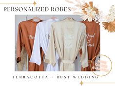 three personalized robes hanging on a wall with flowers in the background and text that reads, terracotta rust wedding