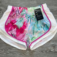 Nike Running Shorts Size Small - Brand New With Tags! Tropical Multicolor Bottoms With Built-in Shorts, Multicolor Athletic Shorts With Built-in Shorts For Spring, Nike Stretch Athletic Shorts For Beach, Nike Athletic Shorts For Beach In Spring, Nike Summer Beachwear Bottoms, Nike Beachwear Bottoms For Summer, Pink Athleisure Athletic Shorts For Summer, Casual Pink Athletic Shorts For Beach Season, Stretch Tropical Shorts