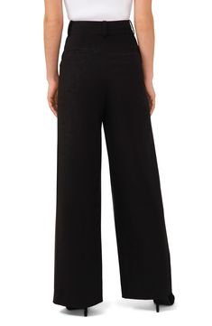 Shake up your casual wardrobe with these simple yet striking pants featuring a fun wide-leg silhouette. 32" inseam; 21" leg opening; 13" front rise; 17" back rise (size 2) 63% polyester, 33% rayon, 4% spandex Machine wash, tumble dry Imported Wide Leg Pants With Loosely Fitted Hips, Black Straight Leg Culottes, Solid Wide Leg Pants For Night Out, Casual Wide Leg Full Length Pants For Night Out, Black Straight Culottes, Black Relaxed Fit Wide Leg Pants, Black Wide Leg Pants With Relaxed Fit, Wide Leg Bottoms For Night Out, Chic Black Full-length Culottes