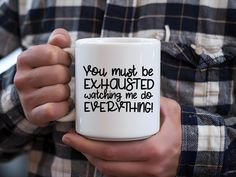 This ceramic mug is perfect for anyone who enjoys a touch of humor in their daily routine. The bold print 'You Must Be Exhausted Watching Me Do Everything' adds a playful vibe to your morning coffee or tea. It's a great gift for friends, family, or coworkers who appreciate a good laugh. Perfect for birthdays, holidays, or just because. Product features - 11oz and 15oz sizes available - Image printed on both sides of mug - Safe for microwave and dishwasher use - Durable white ceramic for long-las Busy People, Sarcastic Quotes, Do Everything, Bold Prints, Mom Dad, Daily Routine, Morning Coffee, Print Images, Coffee Cup