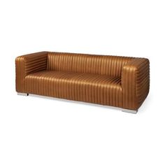 a brown leather couch sitting on top of a white floor next to a metal frame