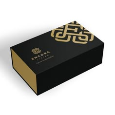 an empty black box with gold foil on it