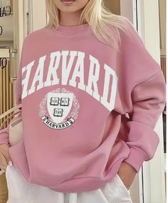 The Harvard Sweatshirt is not just a statement of collegiate style; it's a testament to comfort. Crafted with a soft and cozy fabric, this pullover ensures a luxurious feel, while its true-to-size fit guarantees that you can effortlessly showcase your Harvard pride in comfort and style. Measurements (based on flat lay): Small - Chest 21.5" Length 26" Medium - Chest 22.5" Length 26.5" Large - Chest 23.5" Length 27" Fabric: 100% Polyester Harvard Sweatshirt, Letter Print Sweatshirt, Pink Sweatshirt, Clothing Size Chart, Womens Clothing Sizes, Print Pullover, White Sweatshirt, Casual Sweatshirt, Long Sleeve Casual