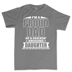 a gray t - shirt that says i'm a proud dad of a freaking awesome daughter