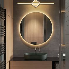 a bathroom with a round mirror and lights on the wall next to it's sink