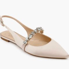 A Classic Sling Back Is A Wardrobe Staple For Its Versatility And No-Frills Design. With A Sharp, Pointed Toe And Low Vamp, The Flat-Soled Bambi Features A Decorative Strap Across The Middle Of The Foot To Add A Pop Of Glamour Without Any Fuss. It’s Easy To Dress This Shoe Up Or Down Or To Take From Day To Night. Slingback Closed, Pointed Toe Ankle Strap Closure Crystal Embellished Strap Flat Shoe Available In Satin And Metallic (Metallic Nappa Pu) German (Textured/Patterned) Rubber Sole Importe Country Club Attire, Best Wedding Shoes, Comfortable Wedding Shoes, Club Attire, Fun Wedding Shoes, Jewel Badgley Mischka, Evening Flats, Bridal Heels, Mother Of Bride