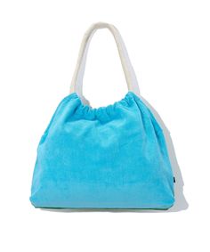 With bold, beachy terry and waterproof lining, this fun-loving tote is as easy-breezy as it gets. Materials: Body: 100% cotton Lining: 100% polyester Made in: India Trendy Cotton Beach Bag For Beach Season, Trendy Cotton Beach Bag, Trendy Cotton Beach Bag For Vacation, Green Summer Beach Bag For Poolside, Green Cotton Beach Bag For Vacation, Blue Beach Bag For Everyday Summer Use, Casual Reversible Beach Bag For Summer, Blue Cotton Beach Bag For Vacation, Casual Reversible Beach Bag For Vacation