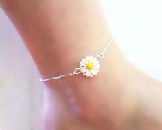 "Pretty little Daisy Anklet or Bracelet. The daisy is handcrafted to a 12mm size. The flower is along a delicate cable chain in a choice of 925 sterling silver or 14k gold filled.Choose from S-M-L-XL length. The Daisy is April's birth flower and a great gift idea for those with an April birthday. -Flower Size : 12mm -Chain : Choose 925 sterling silver or 14k gold filled cable chain View matching collection at: https://www.etsy.com/shop/strandedtreasures/search?search_query=daisy MEASURING GUIDE Adjustable Anklets For Spring Gift, White Daisy Bracelets As Gift, Summer Gift Jewelry With Flower Decoration, Summer Flower Decoration Jewelry Gift, Flower Shaped Anklets For Spring Gift, Delicate White Anklet As A Gift, Flower Anklets For Spring, Perfect As A Gift, Spring Flower Anklets, Dainty White Anklet Suitable For Gift