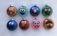 the sesame street ornament ornaments have been painted to look like cartoon characters