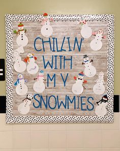 a bulletin board that says chillin with my snowmen on it in front of a tiled wall