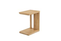 a small wooden table sitting on top of a white floor