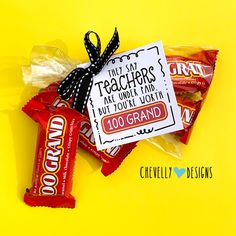 candy bar wrapper with personalized teacher's day tag on it and tied up