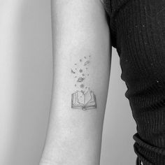 Tiny Book Lover Tattoo, Minimal Book Tattoo Ideas, Books And Music Tattoo, Small Tattoos For Readers, Colorful Book Tattoos, Fine Line Tattoo Book Lover, Fineline Book Tattoo, Little Book Tattoo, Mini Book Tattoos