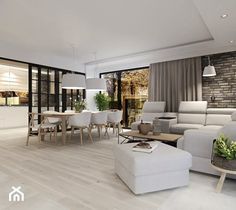 a living room filled with white furniture and lots of windows