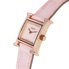 This Hermes XS Heure H watch is in 18k Rose Gold and crafted of 116 diamonds (0.233 ct) Diamond-set rose gold case, Anti-glare sapphire crystal, 52 diamonds (0.072 ct) Diamond-set Rose Opal dial, features a Matte Rose Pale Alligator watch strap, and Rose Pale dial with quartz movement.Origin: SwitzerlandCondition: New and never Accompanied By: Box, and watch box Size: 21mmMeasurements: Watch face: 21mm x 21mm; Strap Length: 6.5" circumference; strap width 17mm" Pink Watches Women, Forbes Cover, Pink Watch, Rose Pale, Rose Gold Case, Gold Ounce, Birkin 25, Watch Box, Gold Case