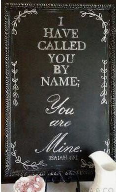 a chalkboard with the words i have called you by name