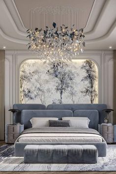 a large bed sitting under a chandelier next to a painting on the wall