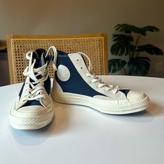 Never Worn White And Navy Blue Converse Chuck 70 High Tops! These Are In Perfect Condition, But Were Just The Wrong Size. Retro Blue Mid-top High-top Sneakers, Blue Converse High-top Sneakers With Gum Sole, Blue Casual High-top Sneakers With Gum Sole, Casual Blue High-top Sneakers With Gum Sole, Retro Blue Sneakers With Laces, Casual Navy High-top Sneakers With Rubber Sole, Casual Navy Converse Sneakers, Navy Blue Converse, Converse Chuck 70 High Top