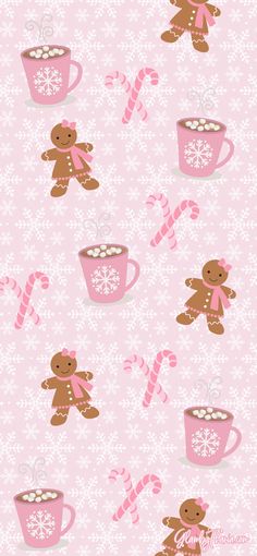 a teddy bear is sitting next to a cup of hot chocolate and candy canes