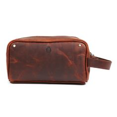 Our leather wash bags make the best men's gift for Christmas, birthday's and even weddings for your Best Man and Groomsmen. Handmade from the finest leather and ykk zipper they are durable and great for traveling the world or travel to and from the gym. Inside there is a waterproof lining and a zip pocket. Everyday Care Caring for your leather goods begins with daily maintenance. By adhering to a few simple guidelines, you can prevent unnecessary wear and tear and prolong the lifespan of your ac Leather Travel Accessories With Zipper Closure, Rectangular Leather Travel Accessories With Zipper Closure, Travel Pouch With Zipper Closure, Leather Travel Pouch With Zipper Closure, Brown Pouch For Everyday Use, Classic Leather Travel Accessories For Gifts, Classic Leather Travel Accessories As Gift, Functional Leather Rectangular Pouch, Brown Leather Travel Accessories As Gift