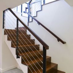 the stairs are made of wood and metal