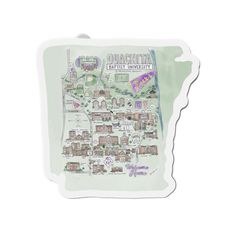 a green and white paper cutout with a map of the city of oakhurst